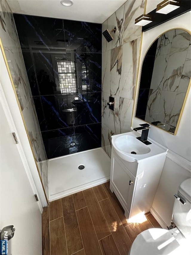 21 Valley Brook Dr, Emerson, NJ 07630 - bathroom with vanity, a marble finish shower, and wood tiled floors