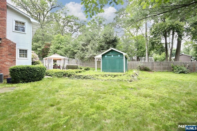 279 Rock Ave, Park Ridge, NJ 07656 - view of yard featuring a gazebo, a shed, and view of wooded area