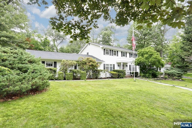 279 Rock Ave, Park Ridge, NJ 07656 - colonial-style house with a front lawn