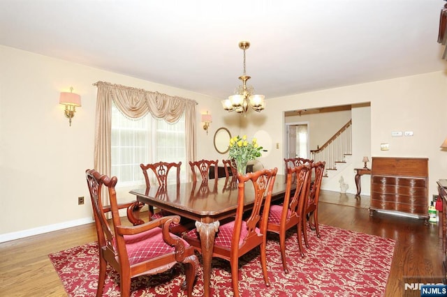 279 Rock Ave, Park Ridge, NJ 07656 - dining room featuring a chandelier, stairway, and wood finished floors