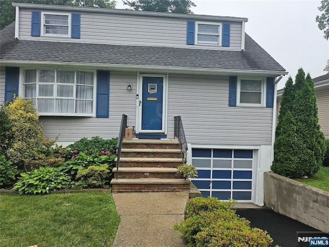 100 Grove St, Waldwick, NJ 07463 - view of front of property with a garage, roof with shingles, and driveway