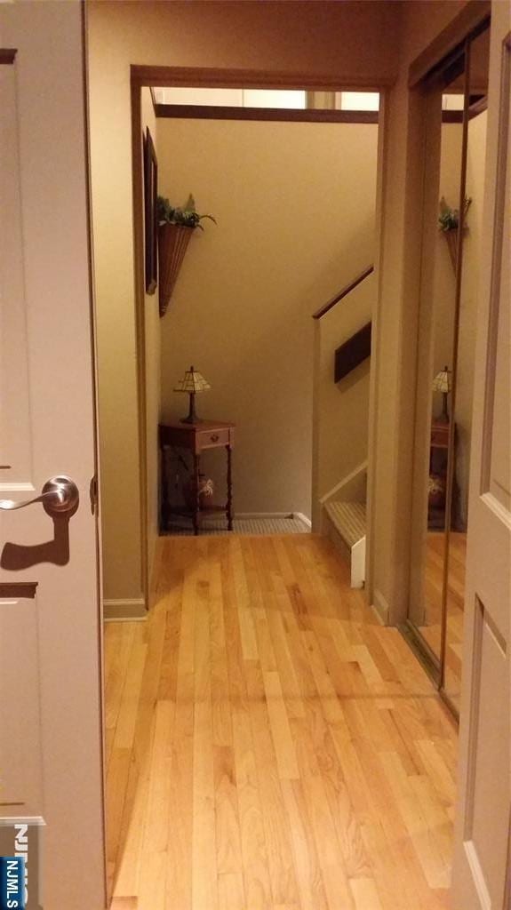 705 Mainsail Ln, Secaucus, NJ 07094 - hall featuring light wood-style floors