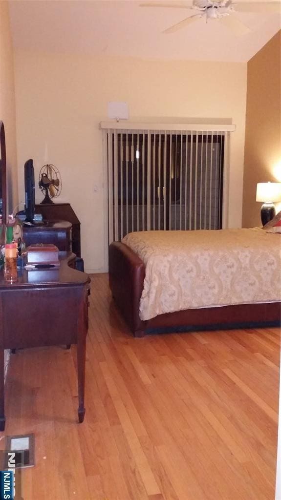 705 Mainsail Ln, Secaucus, NJ 07094 - bedroom featuring wood finished floors and a ceiling fan