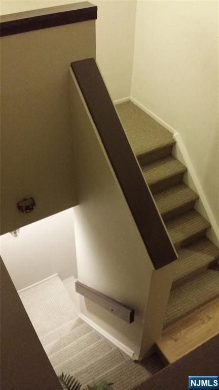705 Mainsail Ln, Secaucus, NJ 07094 - stairway with baseboards