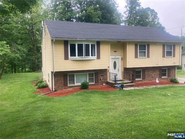116 Scott Rd, Franklin, NJ 07416 - bi-level home with a front lawn, brick siding, and a shingled roof