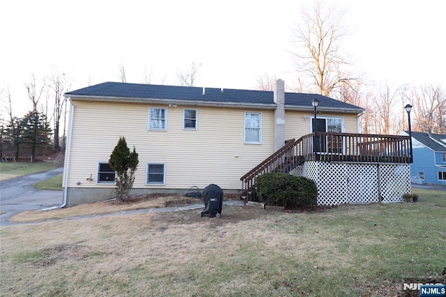 116 Scott Rd, Franklin, NJ 07416 - back of property with a wooden deck, a yard, stairway, and a chimney