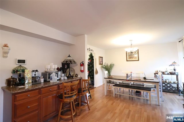 116 Scott Rd, Franklin, NJ 07416 - bar with light wood-style flooring and a chandelier