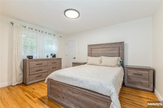63 E Midland Ave, Kearny, NJ 07032 - bedroom featuring light wood-style flooring