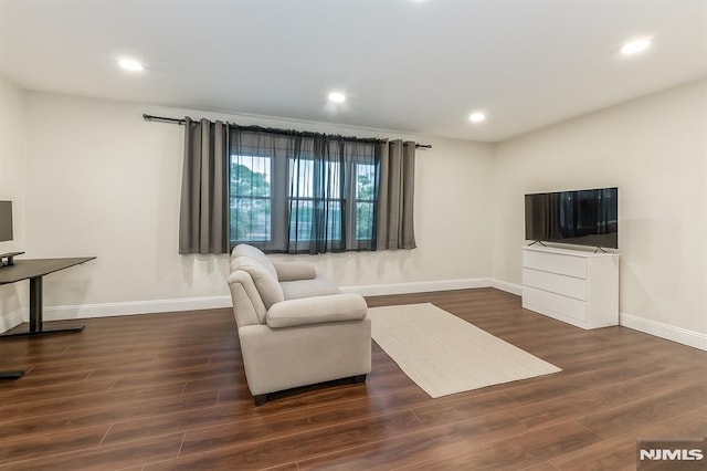 63 E Midland Ave, Kearny, NJ 07032 - living area featuring dark wood-type flooring and recessed lighting