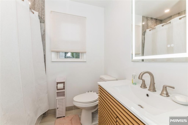 63 E Midland Ave, Kearny, NJ 07032 - bathroom featuring vanity, tile patterned floors, and a shower with curtain