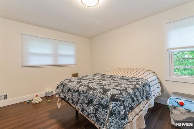 63 E Midland Ave, Kearny, NJ 07032 - bedroom with wood finished floors and baseboards