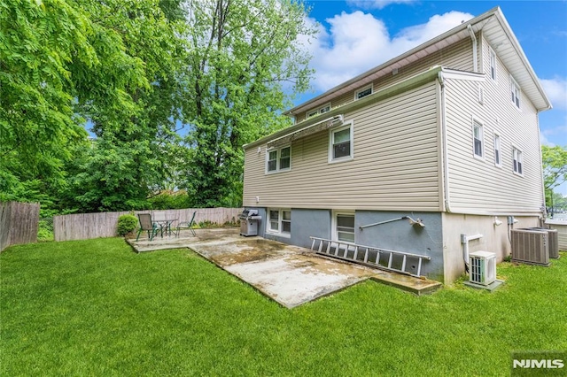 63 E Midland Ave, Kearny, NJ 07032 - rear view of house with a patio