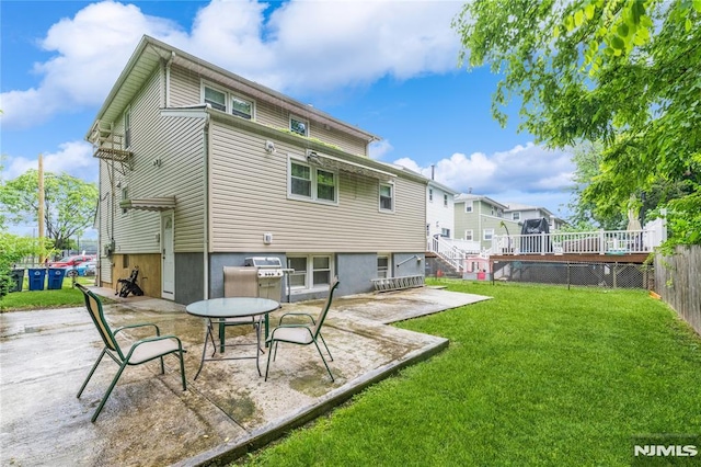 63 E Midland Ave, Kearny, NJ 07032 - rear view of house with a patio area and a deck