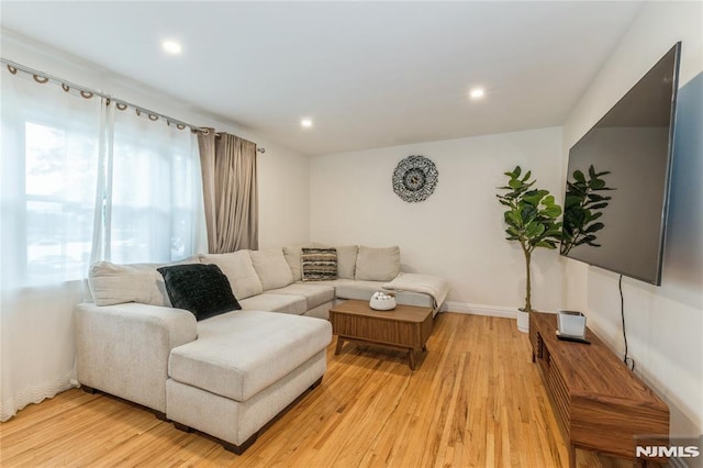 63 E Midland Ave, Kearny, NJ 07032 - living room featuring light wood-style floors and recessed lighting