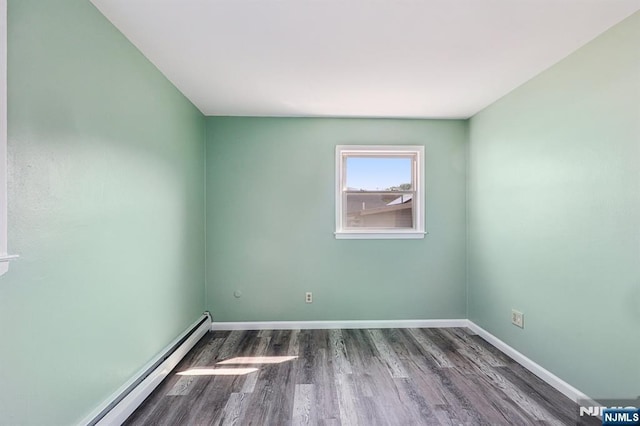 17 Cuozzo St Unit 27, Belleville, NJ 07109 - unfurnished room featuring baseboard heating and wood finished floors