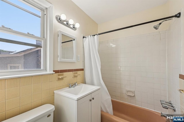 17 Cuozzo St Unit 27, Belleville, NJ 07109 - full bath with shower / bath combination with curtain, vanity, tile walls, and wainscoting