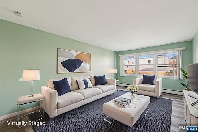 17 Cuozzo St Unit 27, Belleville, NJ 07109 - living area with wood finished floors and baseboard heating