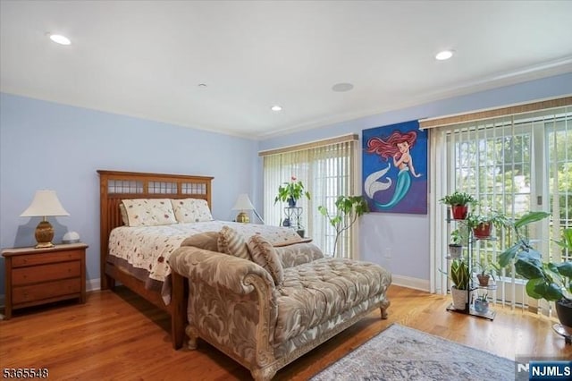 4 Lowell Ct Unit 704, Teaneck, NJ 07666 - bedroom featuring wood finished floors and recessed lighting