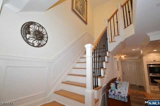 4 Lowell Ct Unit 704, Teaneck, NJ 07666 - stairs featuring a decorative wall and crown molding