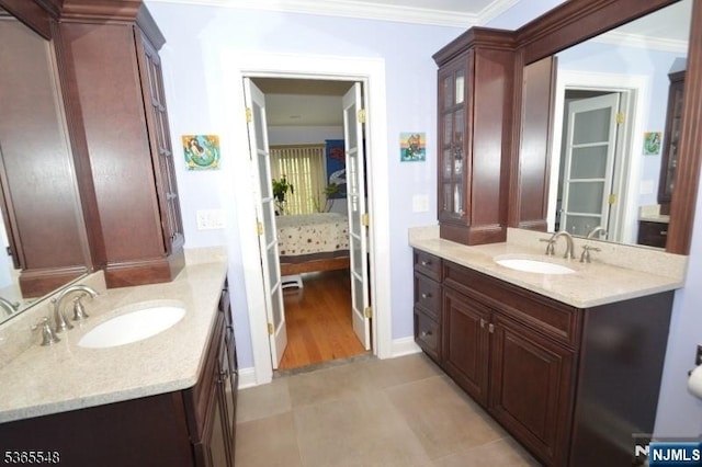 4 Lowell Ct Unit 704, Teaneck, NJ 07666 - full bath with vanity, crown molding, and tile patterned flooring