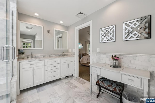490 Ackerman Ave, Ho-Ho-Kus, NJ 07423 - full bathroom featuring double vanity, a stall shower, healthy amount of natural light, a wainscoted wall, and recessed lighting