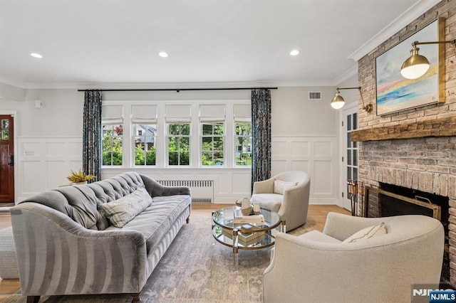 490 Ackerman Ave, Ho-Ho-Kus, NJ 07423 - living room featuring a decorative wall, radiator heating unit, crown molding, recessed lighting, and a wainscoted wall