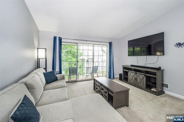 462 Poets Way, Mahwah, NJ 07430 - living area with vaulted ceiling, carpet flooring, and a fireplace