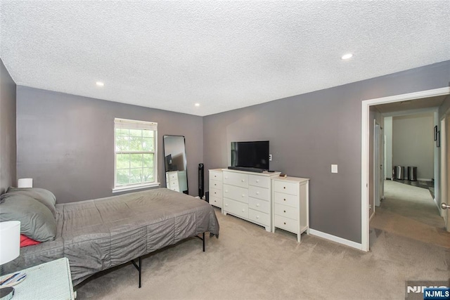 462 Poets Way, Mahwah, NJ 07430 - bedroom with light colored carpet, a textured ceiling, and recessed lighting