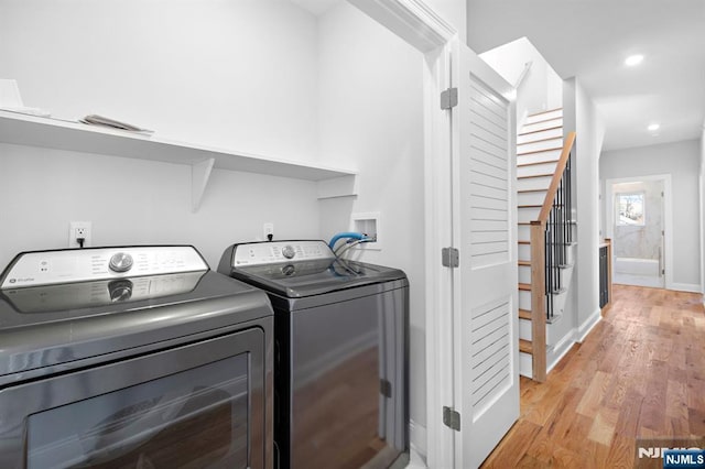 227 Wayne Ave Unit A, Cliffside Park, NJ 07010 - laundry room featuring washer and clothes dryer, light wood-style flooring, and recessed lighting