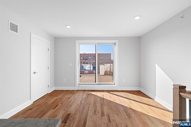 227 Wayne Ave Unit A, Cliffside Park, NJ 07010 - empty room with wood finished floors and recessed lighting