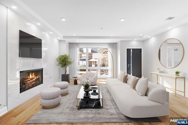 227 Wayne Ave Unit A, Cliffside Park, NJ 07010 - living room with a fireplace, wood finished floors, and recessed lighting