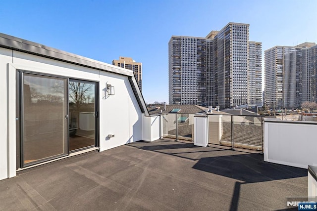 227 Wayne Ave Unit A, Cliffside Park, NJ 07010 - view of patio featuring a city view