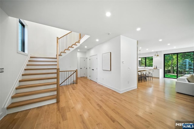 30 Benjamin Rd, Tenafly, NJ 07670 - stairs with wood finished floors and recessed lighting