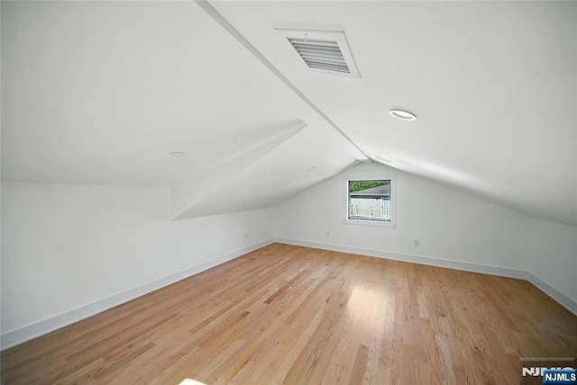30 Benjamin Rd, Tenafly, NJ 07670 - bonus room featuring vaulted ceiling and light wood-style floors