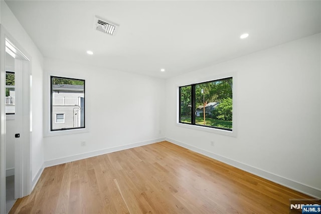 30 Benjamin Rd, Tenafly, NJ 07670 - spare room with light wood finished floors and recessed lighting