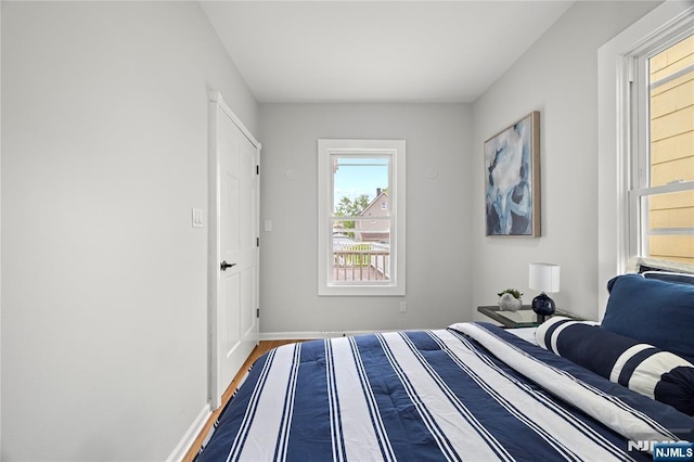 422 Davis Ave, Kearny, NJ 07032 - bedroom with wood finished floors and baseboards