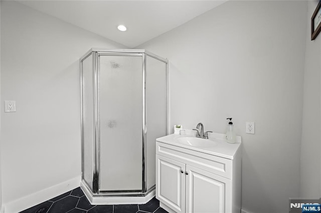 422 Davis Ave, Kearny, NJ 07032 - bathroom with a stall shower, tile patterned flooring, and vanity
