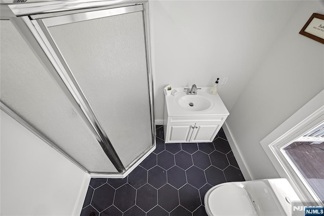 422 Davis Ave, Kearny, NJ 07032 - full bathroom with tile patterned floors, a shower stall, and vanity
