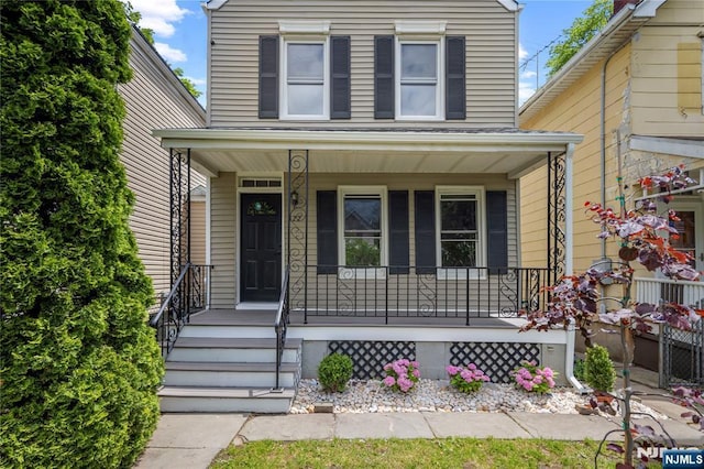 422 Davis Ave, Kearny, NJ 07032 - view of front of house featuring covered porch