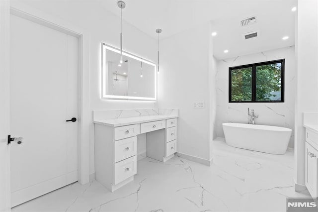 172 Birchwood, Old Tappan, NJ 07675 - full bath with marble tiled floors, vanity, a freestanding bath, and recessed lighting