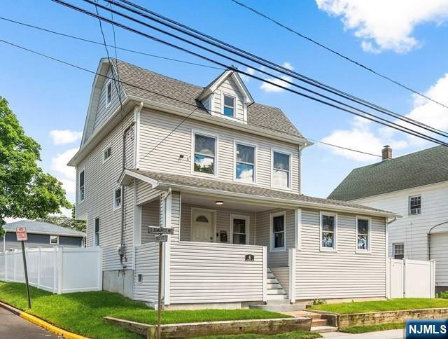 41 S Demarest Ave, Bergenfield, NJ 07621 - american foursquare style home with stairway and a porch