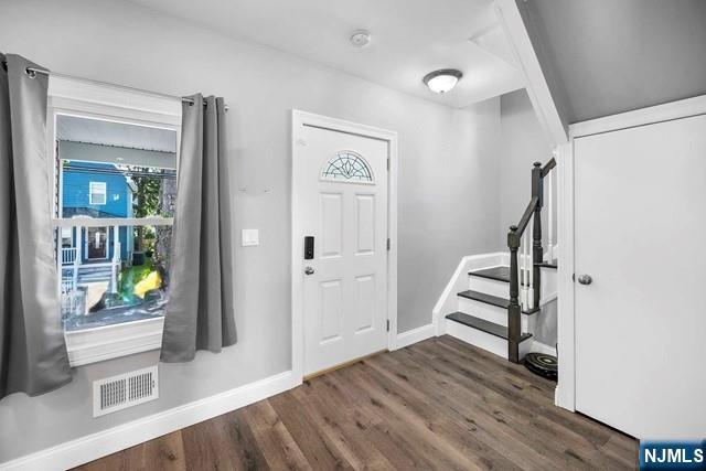 41 S Demarest Ave, Bergenfield, NJ 07621 - foyer entrance with wood finished floors and stairway