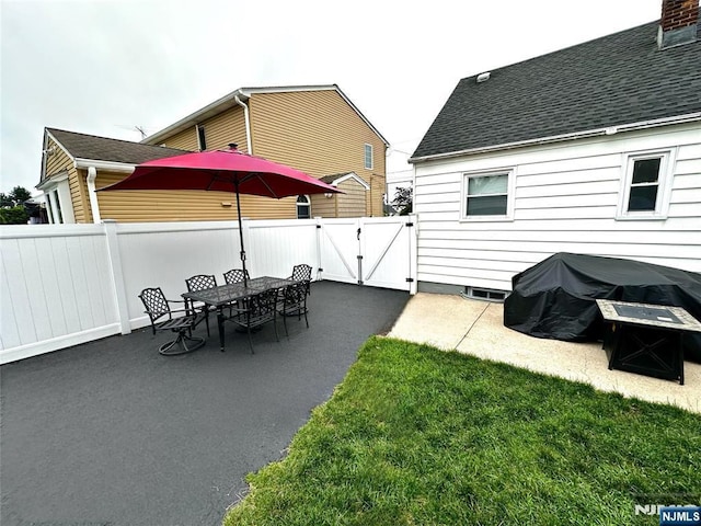 265 Wilson St, Saddle Brook, NJ 07663 - view of patio / terrace featuring a gate and outdoor dining area