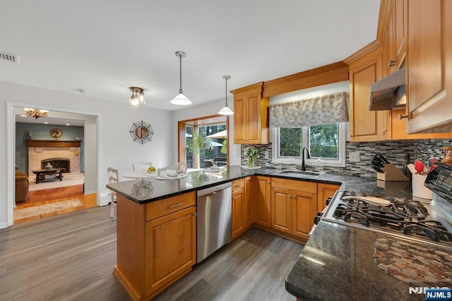 552 Godwin Ave, Midland Park, NJ 07432 - kitchen featuring dishwasher, extractor fan, wood finished floors, and backsplash