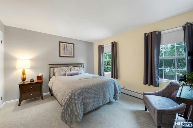 552 Godwin Ave, Midland Park, NJ 07432 - bedroom with a baseboard heating unit and light colored carpet