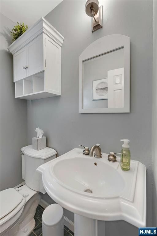 552 Godwin Ave, Midland Park, NJ 07432 - bathroom featuring toilet and a sink