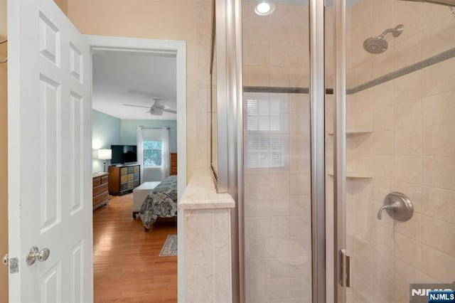 552 Godwin Ave, Midland Park, NJ 07432 - ensuite bathroom with a shower stall, wood finished floors, and a ceiling fan