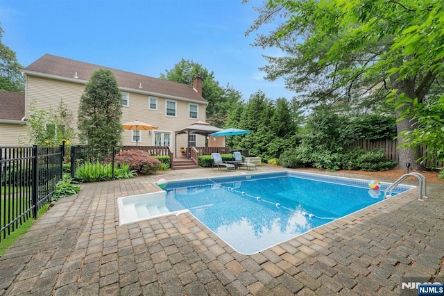 552 Godwin Ave, Midland Park, NJ 07432 - view of pool featuring a wooden deck, a fenced backyard, and a patio area