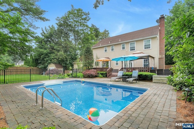 552 Godwin Ave, Midland Park, NJ 07432 - view of swimming pool with a wooden deck and a patio