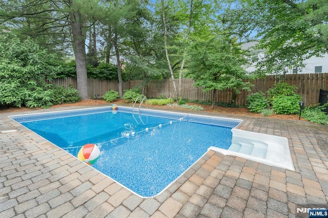 552 Godwin Ave, Midland Park, NJ 07432 - view of swimming pool featuring a fenced backyard and a patio area